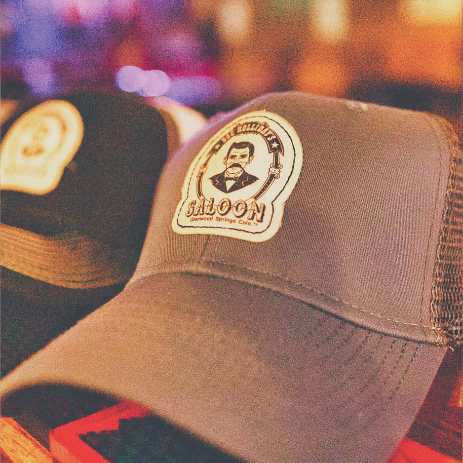 Gray Baseball Cap with a logo that reads "Doc Holliday's Saloon, glenwood springs, colorado